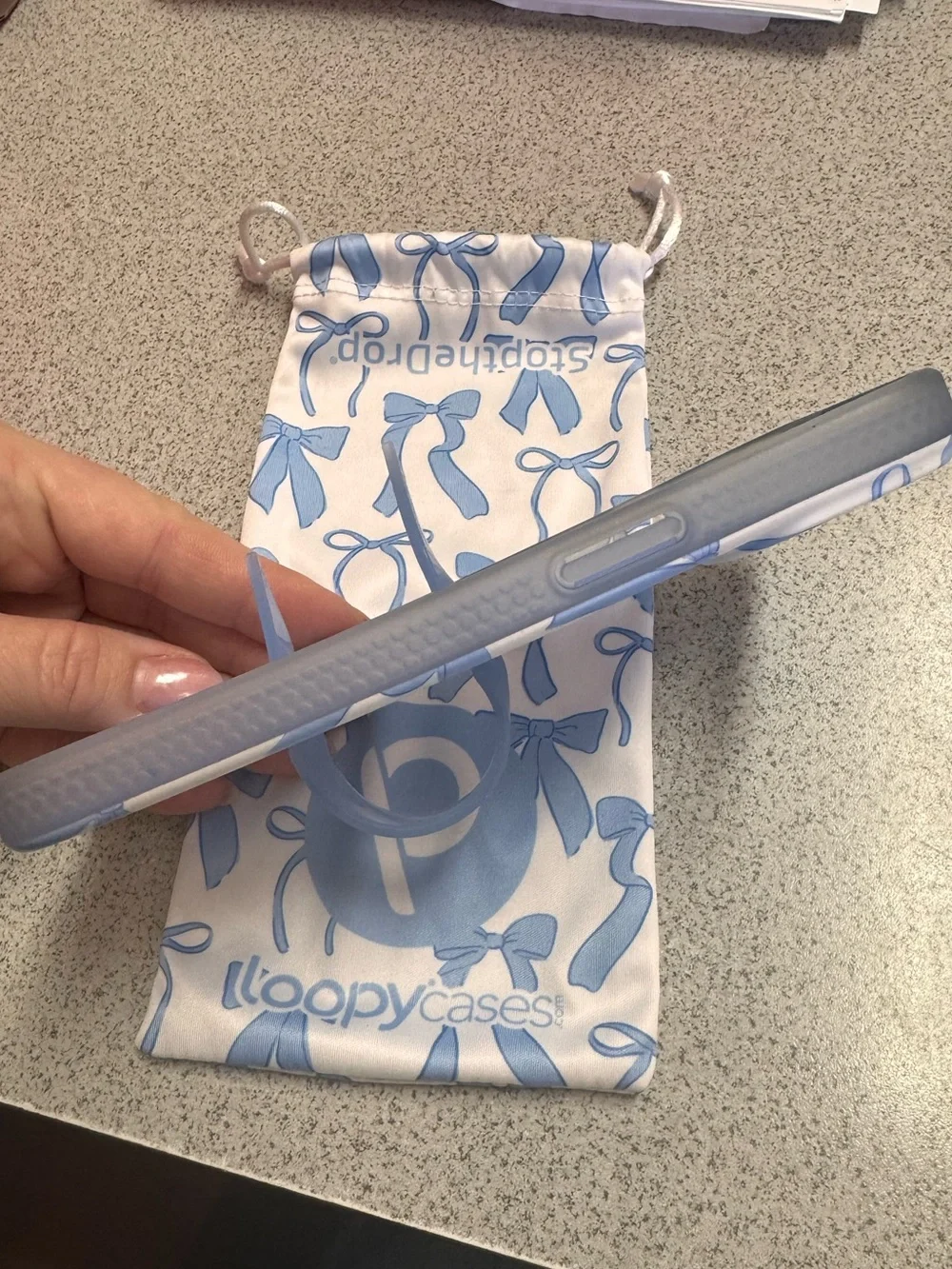 Loopy Case Light Blue Bow for IPhone 15.